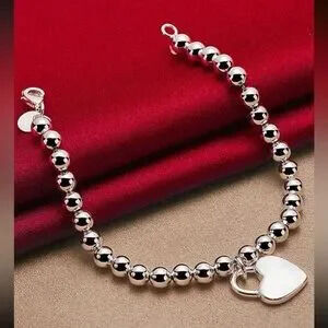 Silver Tone Heart Pendant Bead Bracelet